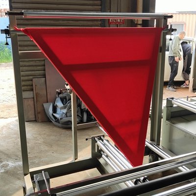 Film triangle folding machine folder